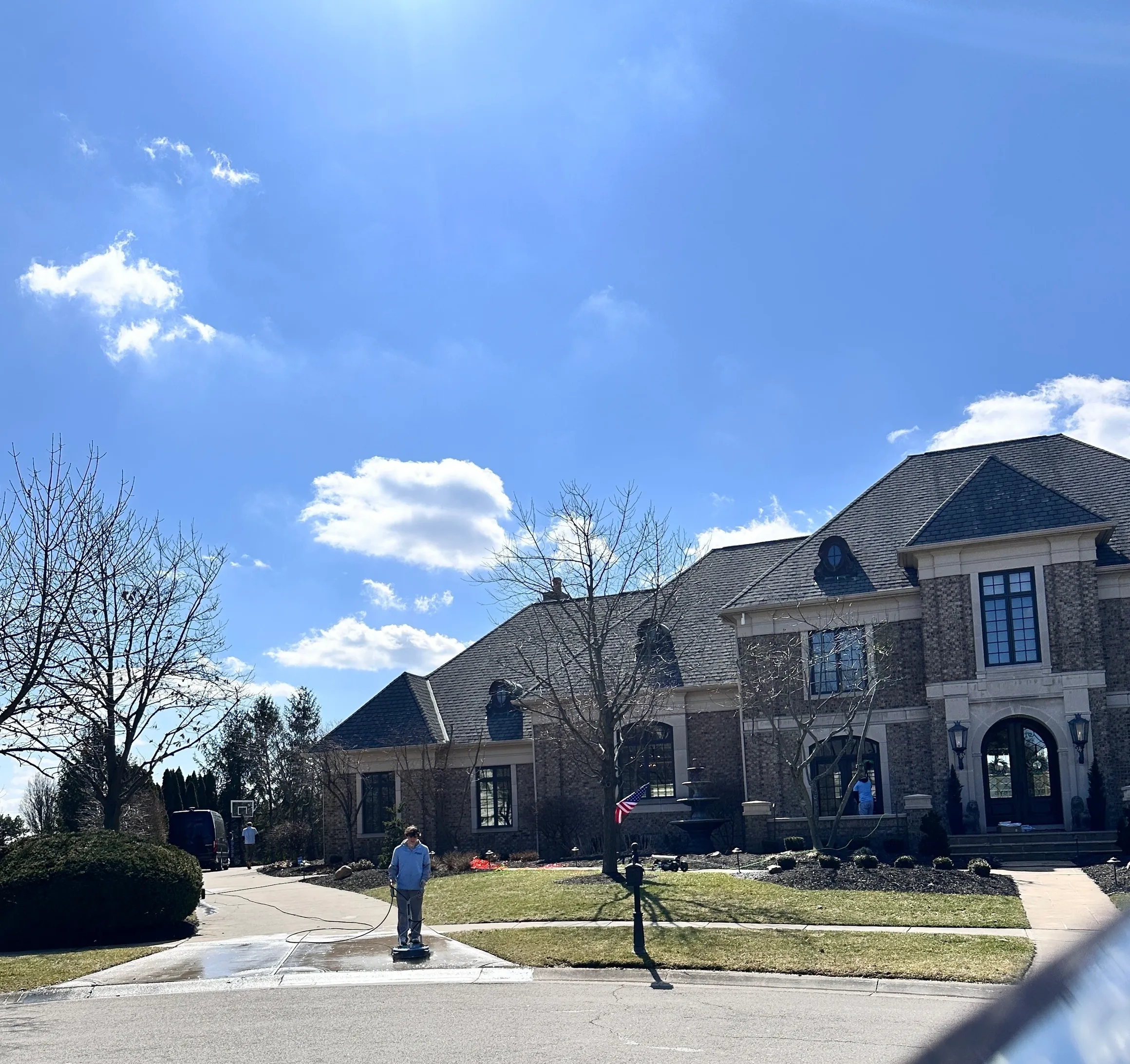 Large house under a clear blue sky.